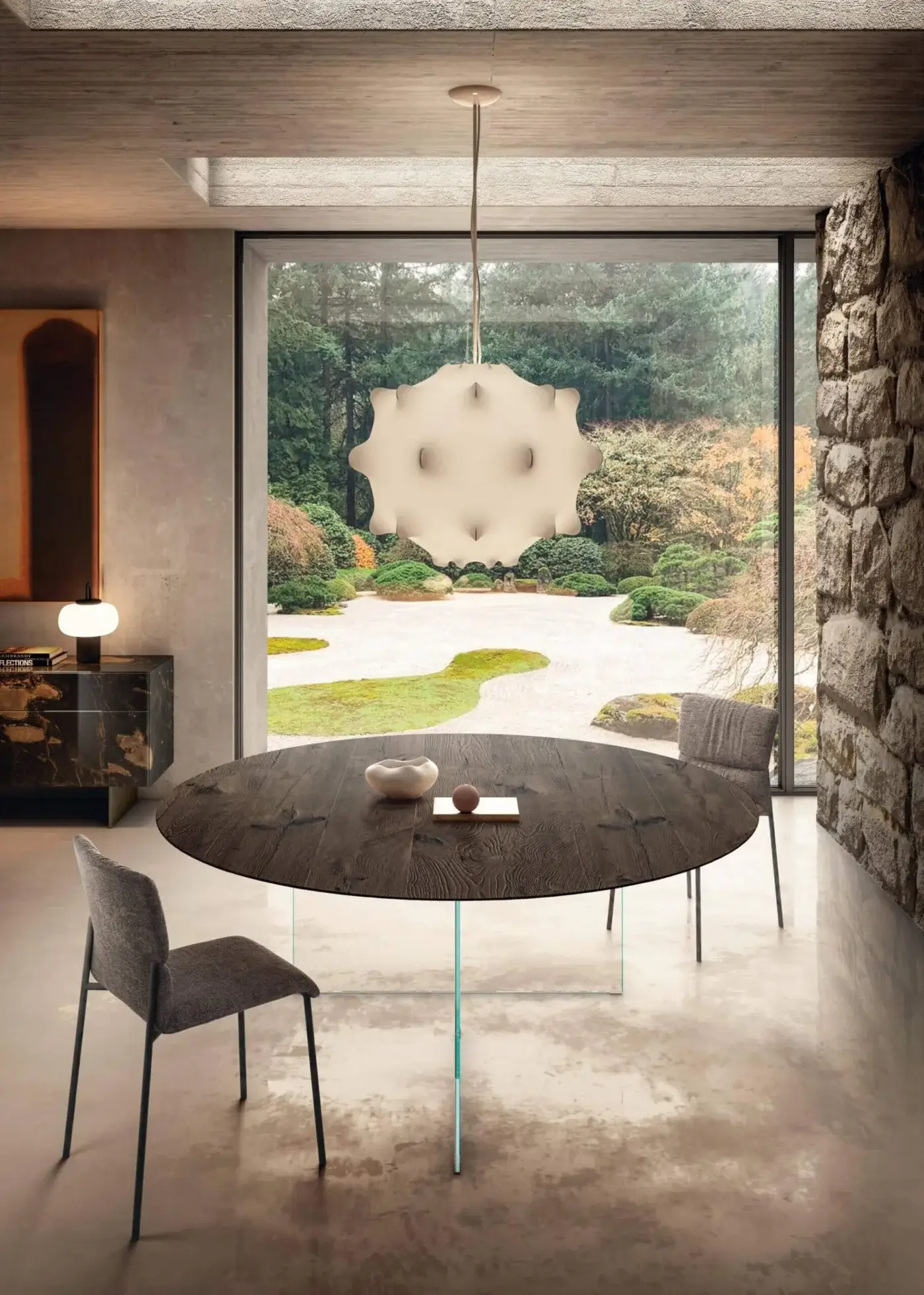 Captivating Lago Air Slim round table with dark brown wood exhibiting natural grain and transparent tempered-glass base crafted in Italy
