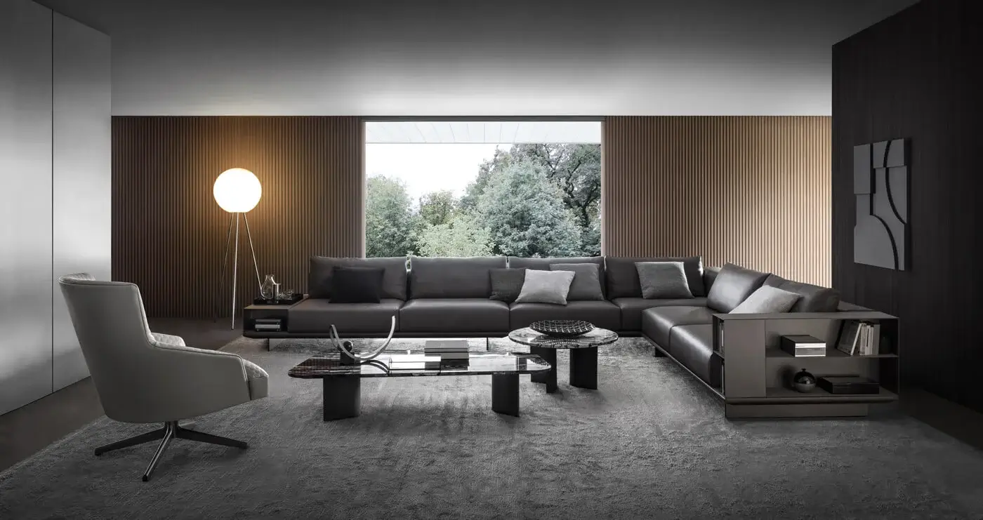 Distinguished 4 Mariani Asso sectional sofa upholstered in smooth matte black leather with a modular design and built-in shelving unit