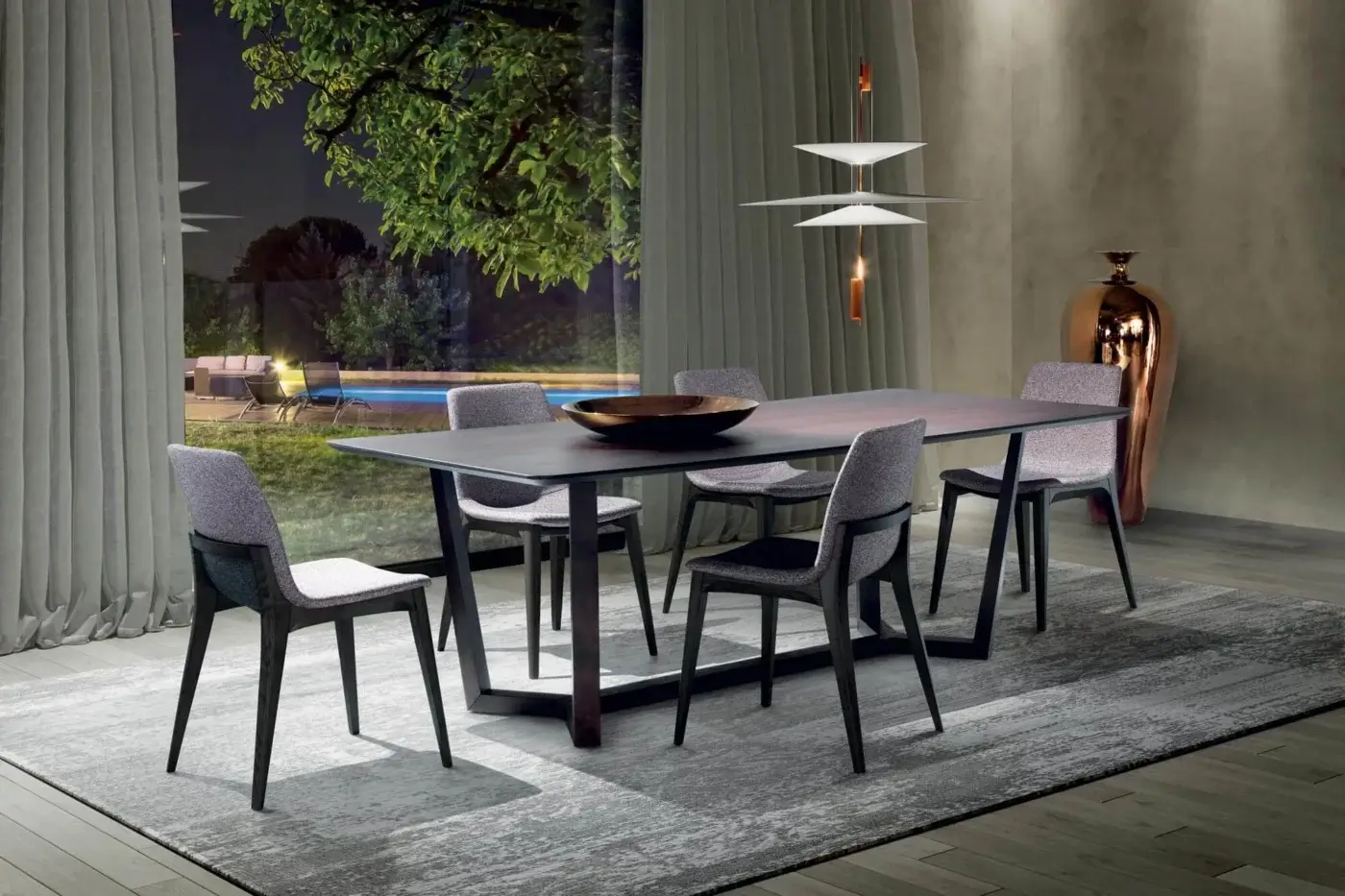 Distinguished Pacini & Cappellini Aliante table with dark wood veneered ash top and geometric cutouts in a solid ash base