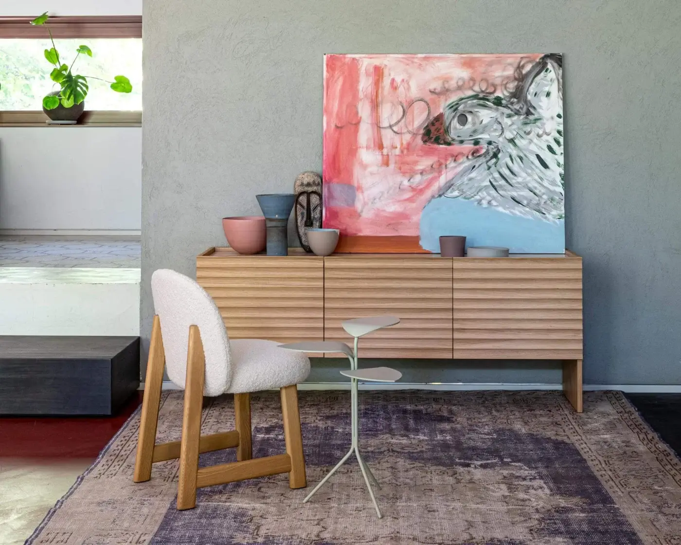 Exceptional Moroso Pheaby chair built in painted ash with softly rounded seating upholstered in off-white fleece-like textile