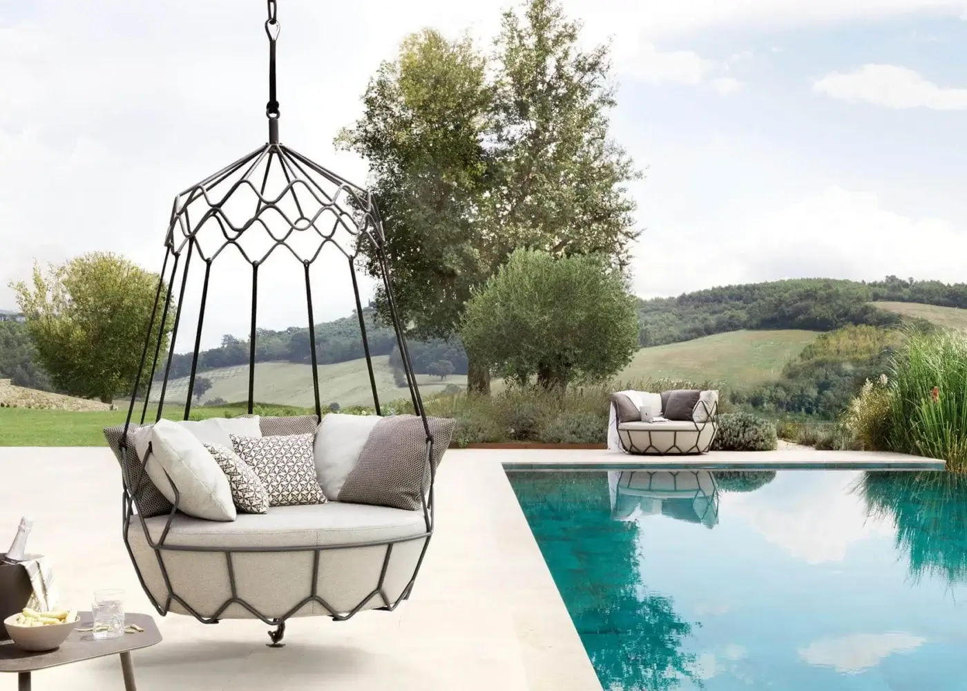 Exceptional Roberti Rattan Gravity lounge chair crafted with dark matte stainless steel and nautical rope, featuring light grey patterned cushions