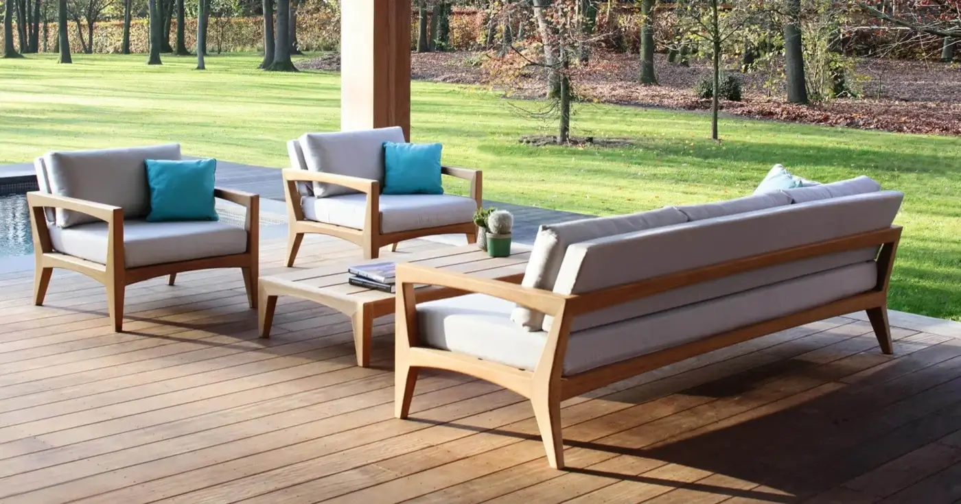Distinguished Royal Botania Zenhit lounge chair crafted with teak wood and light gray cushions complemented by a turquoise accent