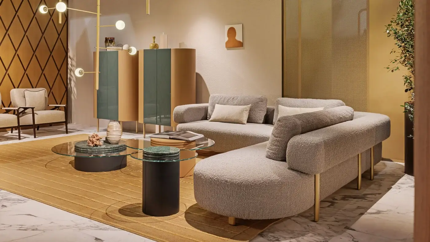 Exceptional Turri Roma sectional with generous seating, independent cushions upholstered in light grey textured fabric and champagne gold metal legs