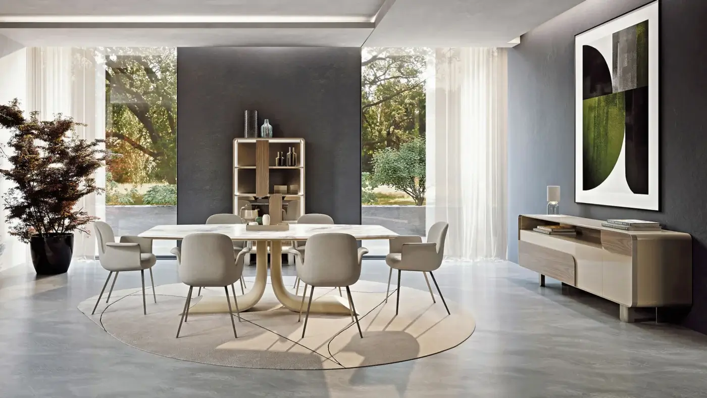 Distinguished Turri Soul table showcases a serpentine central leg with a dynamic oblique cut in light-toned stone and synthetic material