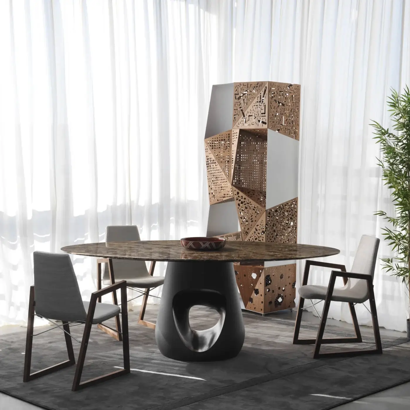 Distinctive Horm Barbara table with swirling brown and tan marble top and matte concrete sculptural base