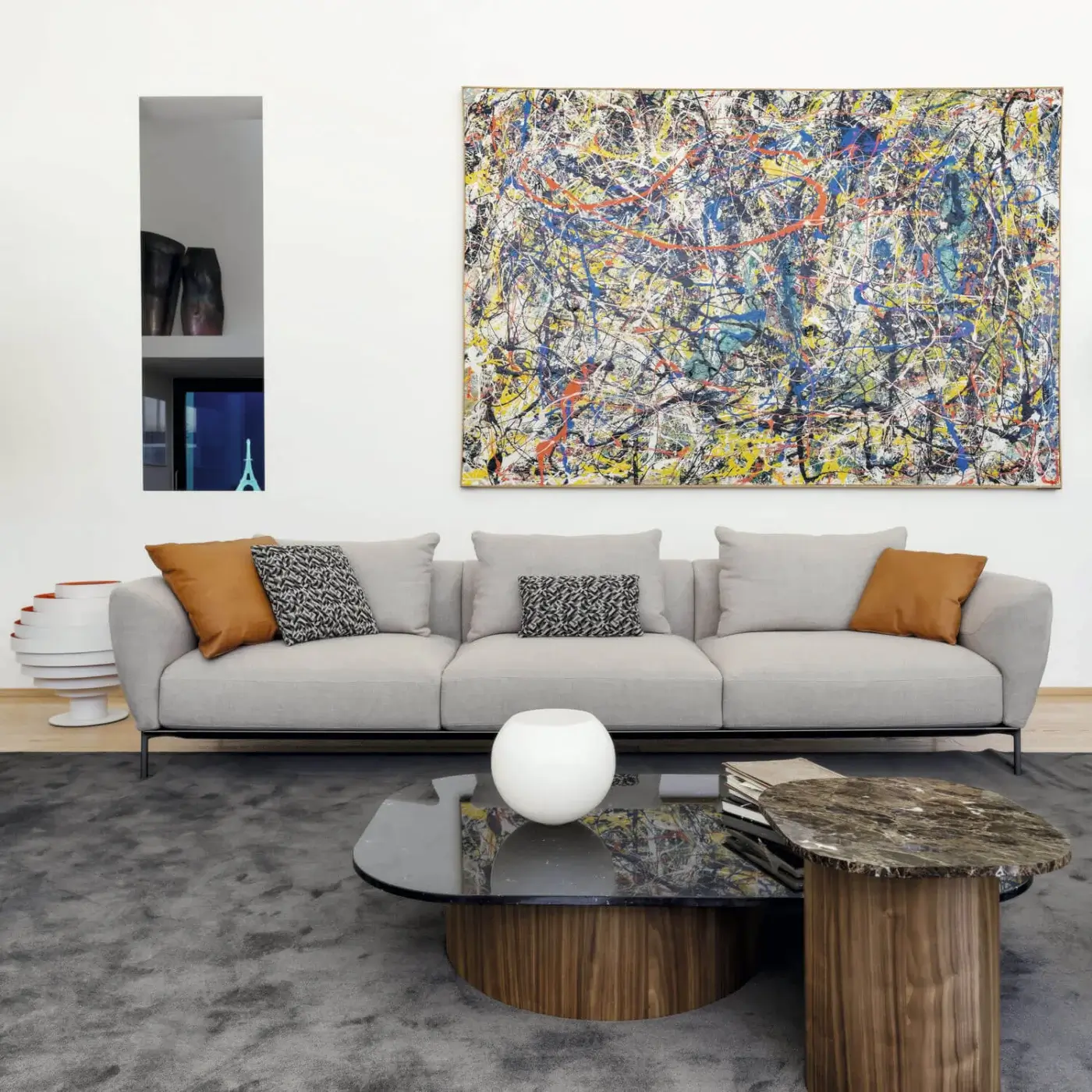 Superior Horm Ella sofa, a three-seater upholstered in light gray textile with smooth matte finish and dark metal base
