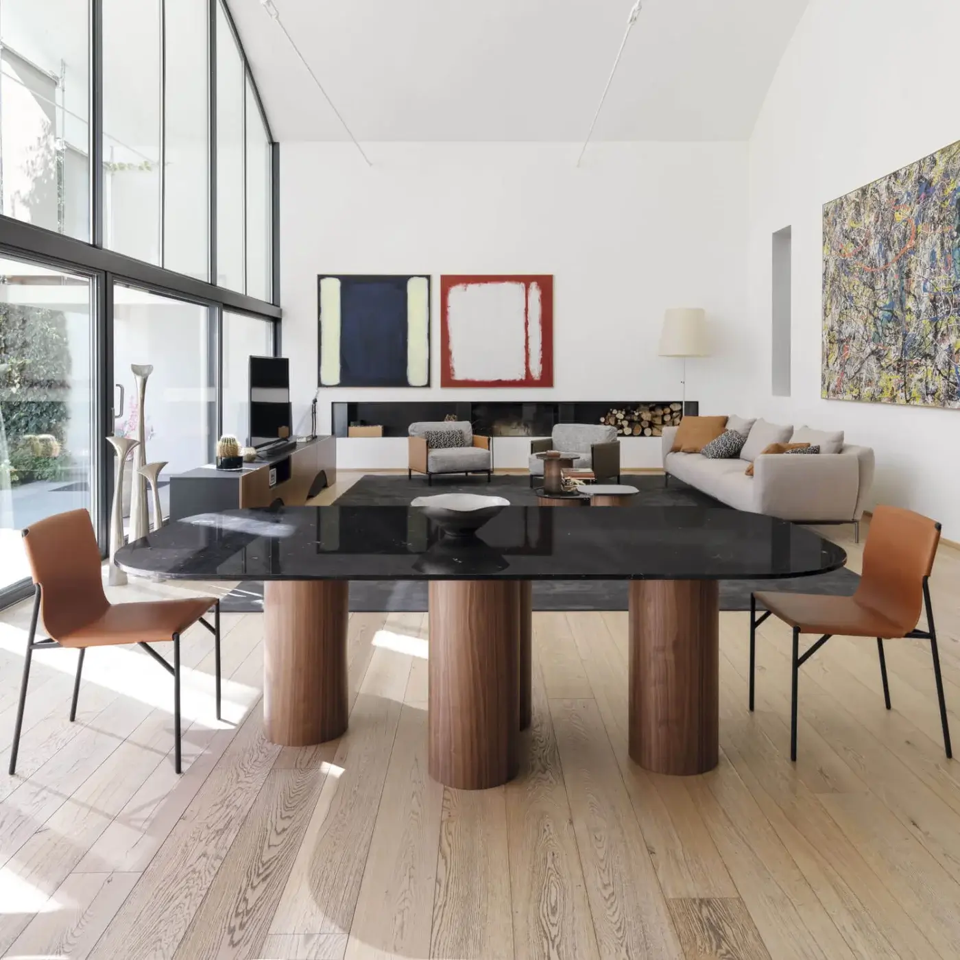 Exceptional Horm Marina table built with glossy black marble and cylindrical walnut legs inspired by Venetian art