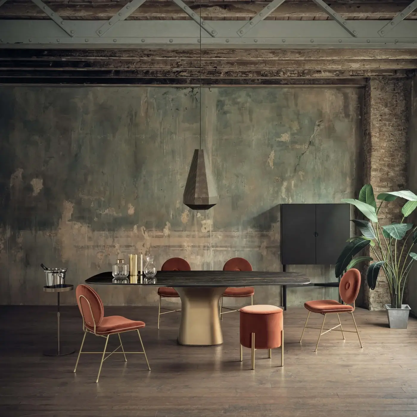 Distinctive Bontempi Podium Barrel table with sinuous lines, glossy dark surface and lustrous metallic gold concrete base