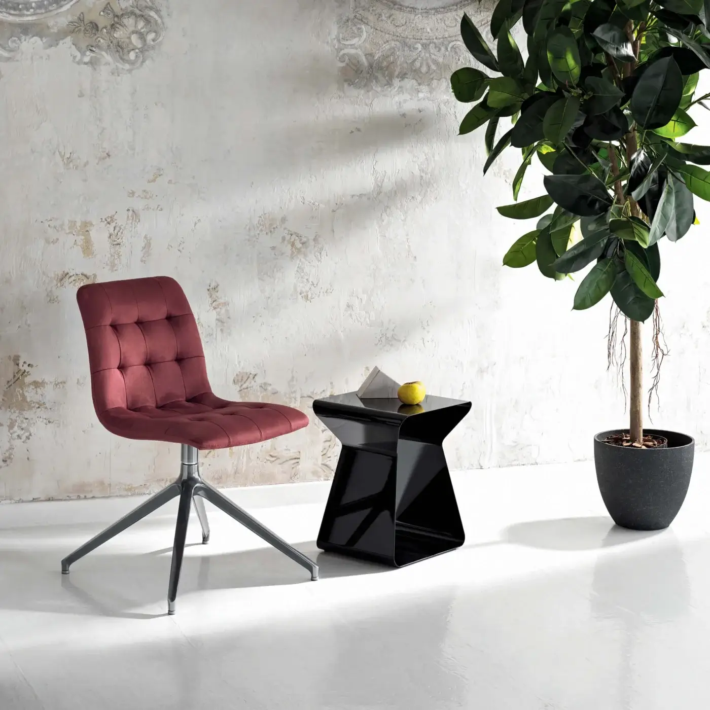 Stylish Bontempi Kuga swivel chair in deep red textile with square quilting and matte silver metal base
