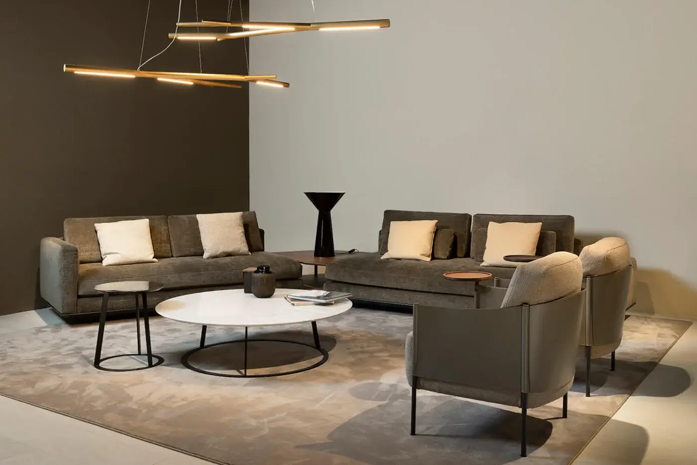 Superior Horm SC1 lounge chair crafted in textured medium gray textile with Canaletto walnut accents and black painted metal legs
