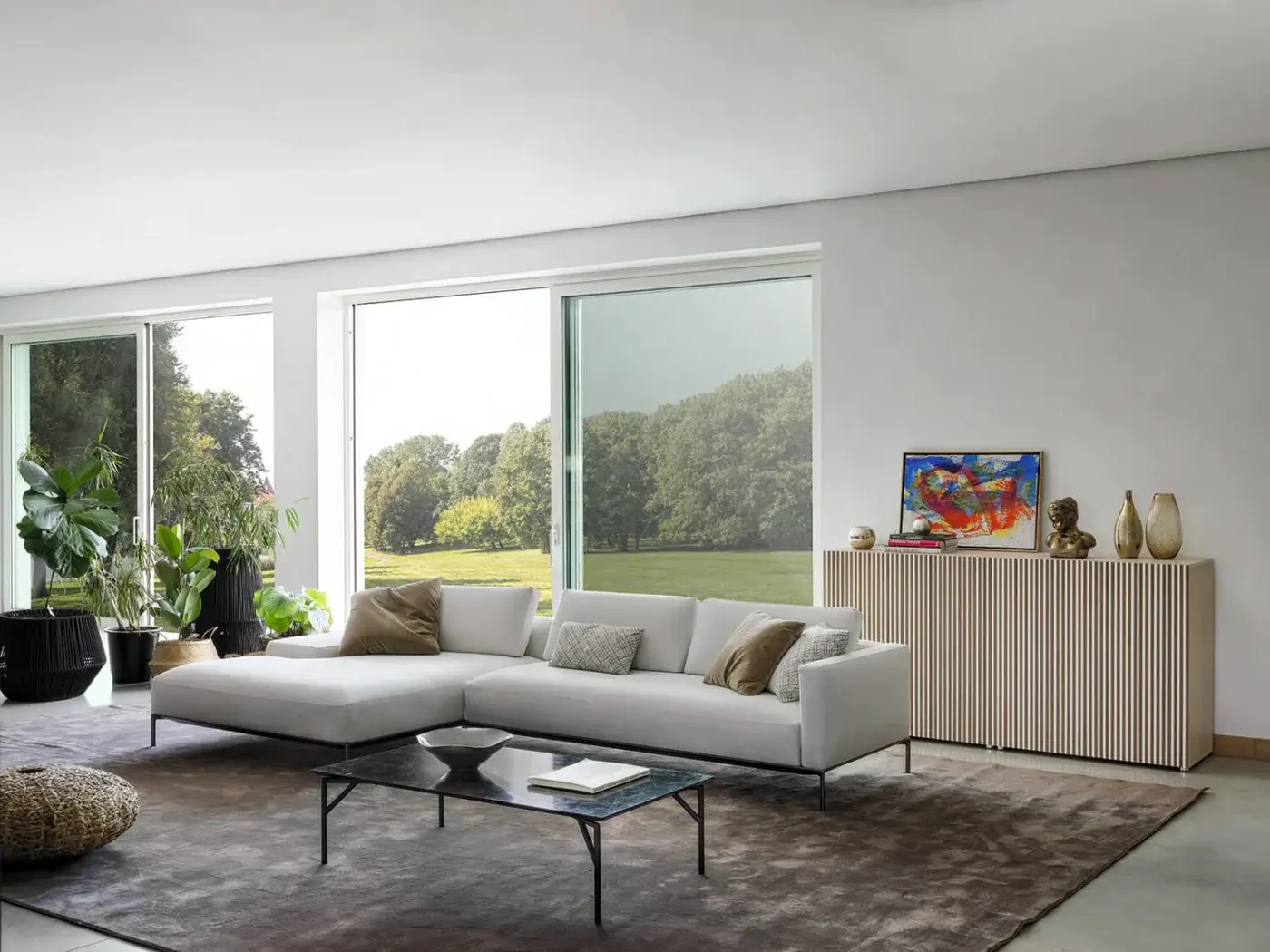 Elegant Horm Tout Le Jour coffee table with dark glass top and matte dark metal frame crafted in Italy