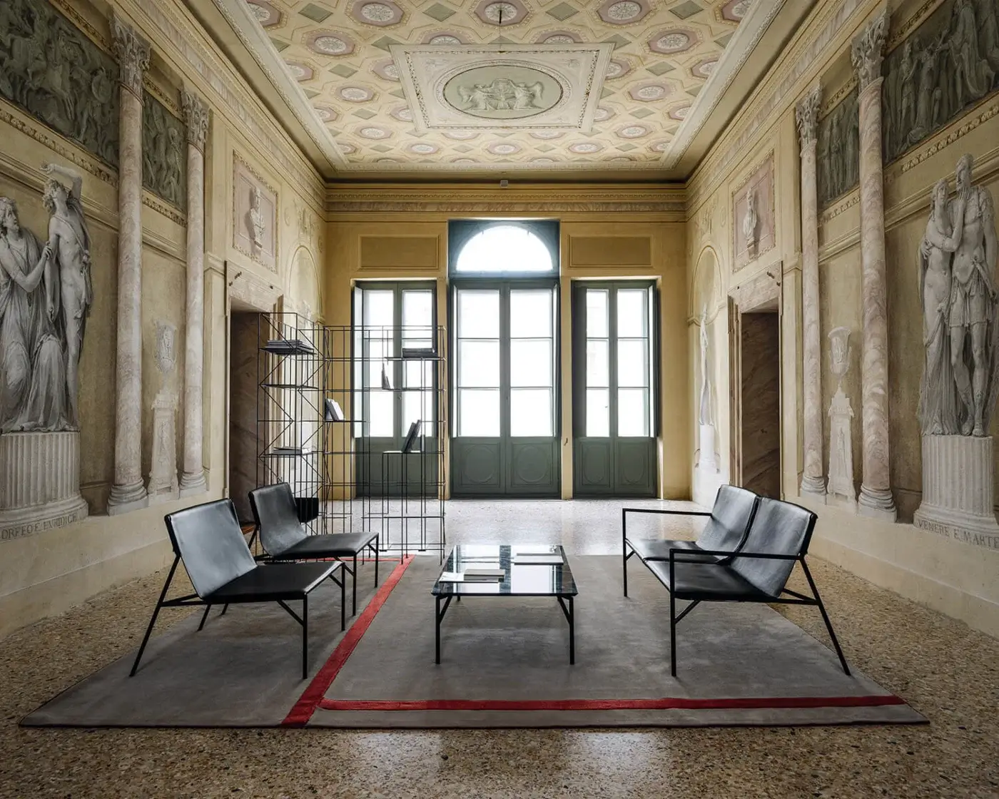 Distinguished Horm Tout Le Jour coffee table with transparent glass top and sleek matte black metal frame crafted in Italy