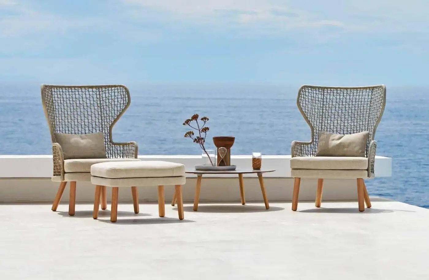 Exceptional Varaschin Emma coffee table with dark Bush-hammered ceramic top and light-toned wooden legs crafted in Italy