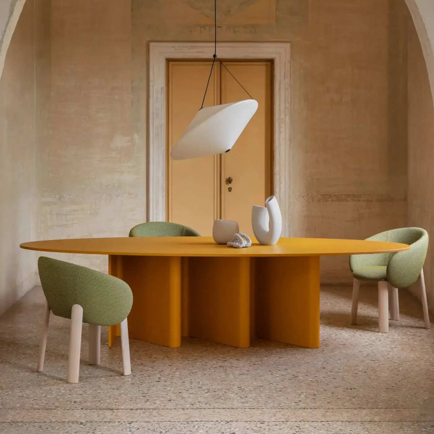 Elegant Miniforms Nami table crafted with bent wood base and oval tabletop lacquered in matte yellow