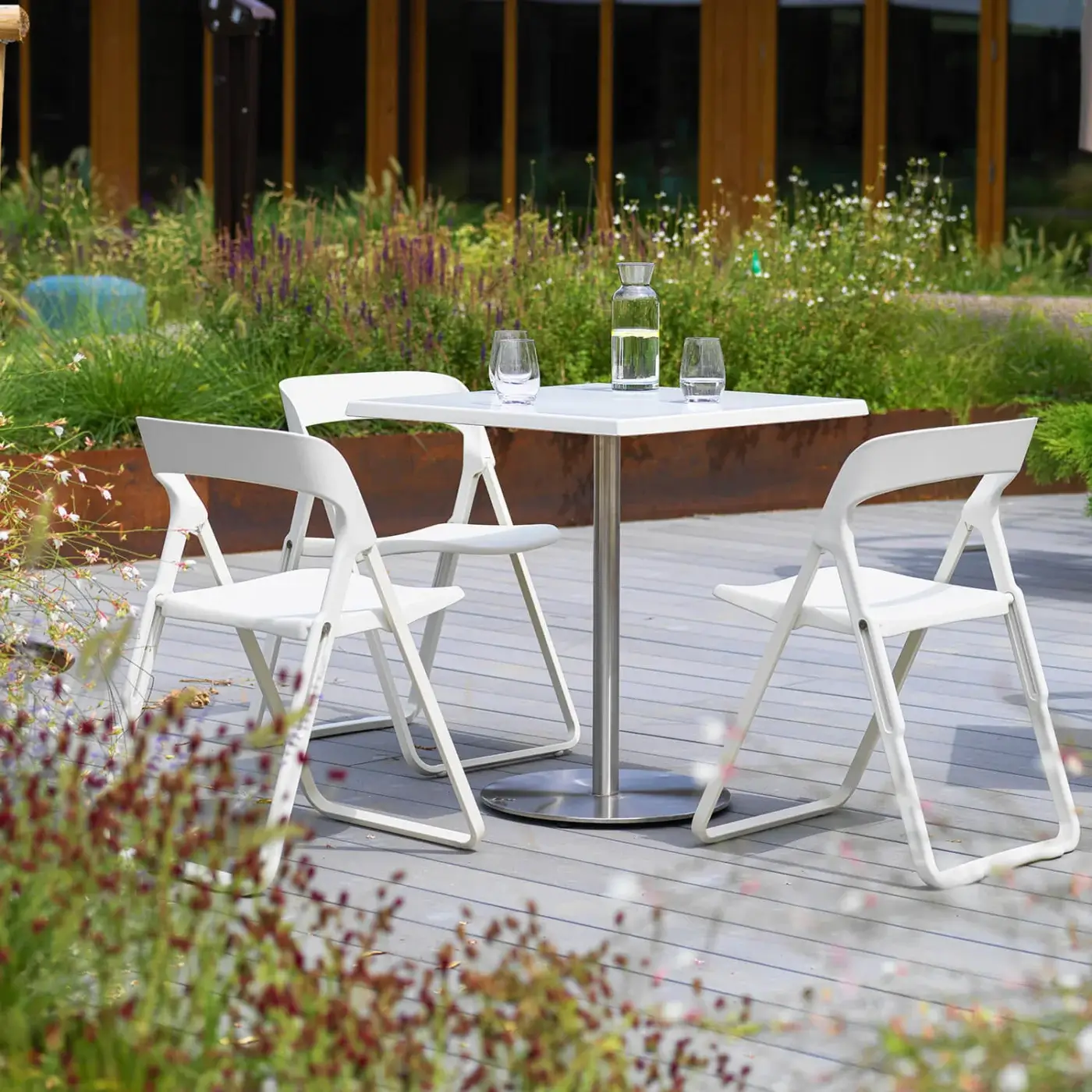 Innovative Casamania Bek chair in matte white crafted with injection-molded fiberglass-reinforced synthetic material