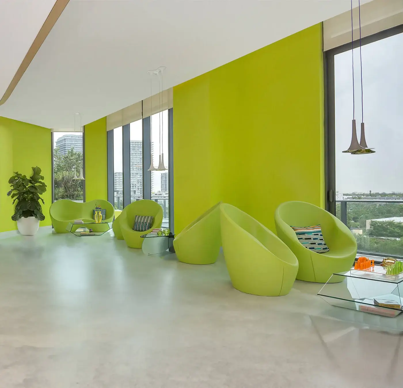 Exceptional Casamania Ouch lounge chair exhibits a voluptuous organic form upholstered in vibrant lime green fabric with a metal structure