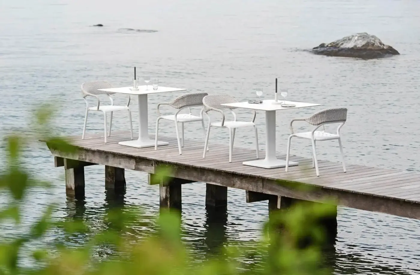 Exceptional Varaschin Noss armchair crafted with aluminum and hand-woven white polypropylene rope in a matte finish