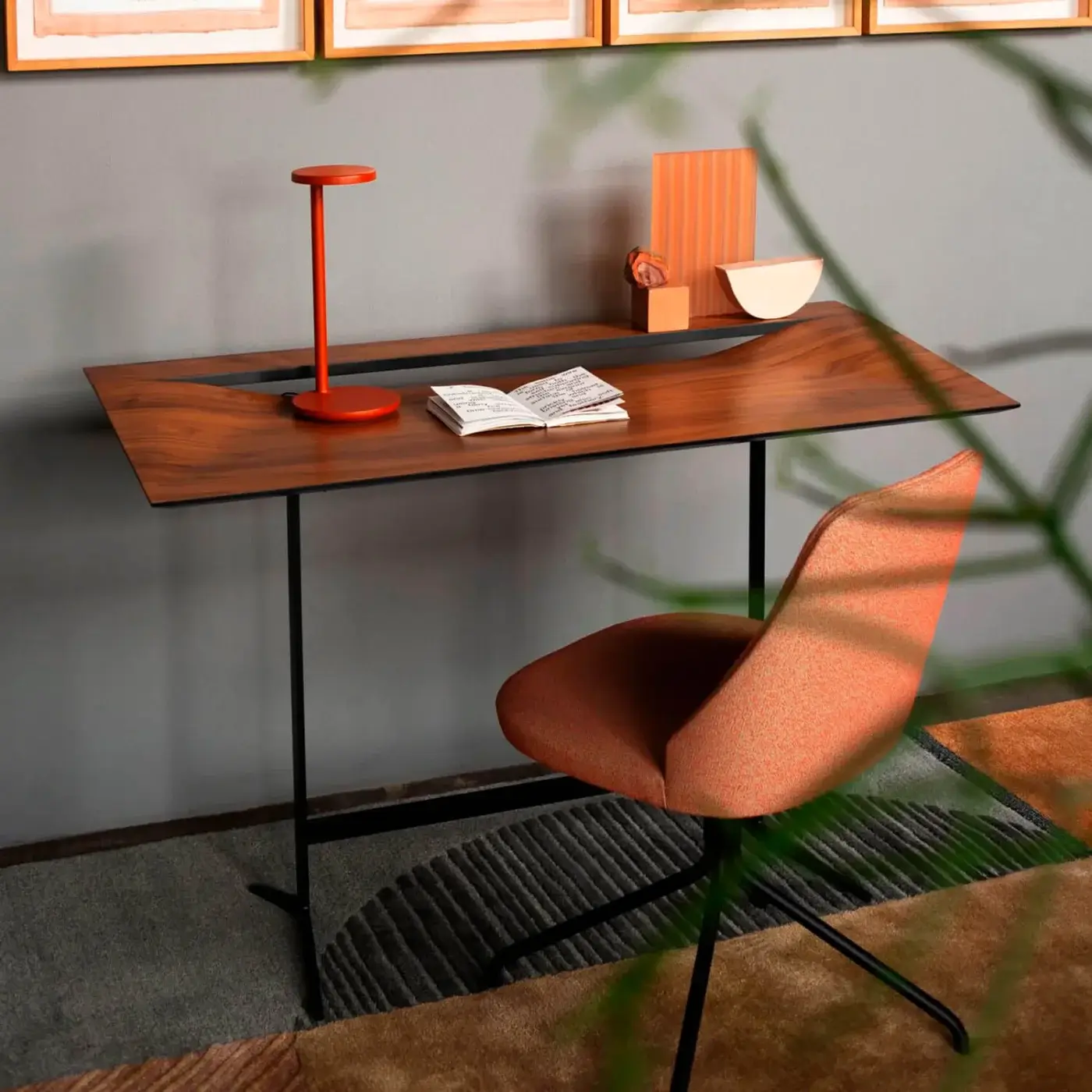 Superior Bross Cut desk with a rich brown wood top and black lacquered metal frame exhibiting a smooth finish
