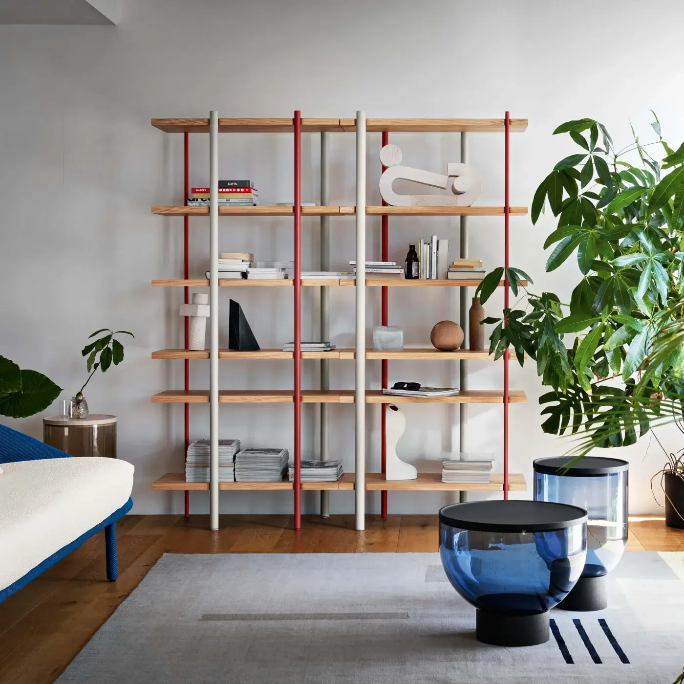 Distinctive Miniforms Milonga bookcase with light-toned wooden shelves and alternating matte red and grey metal uprights crafted in Italy