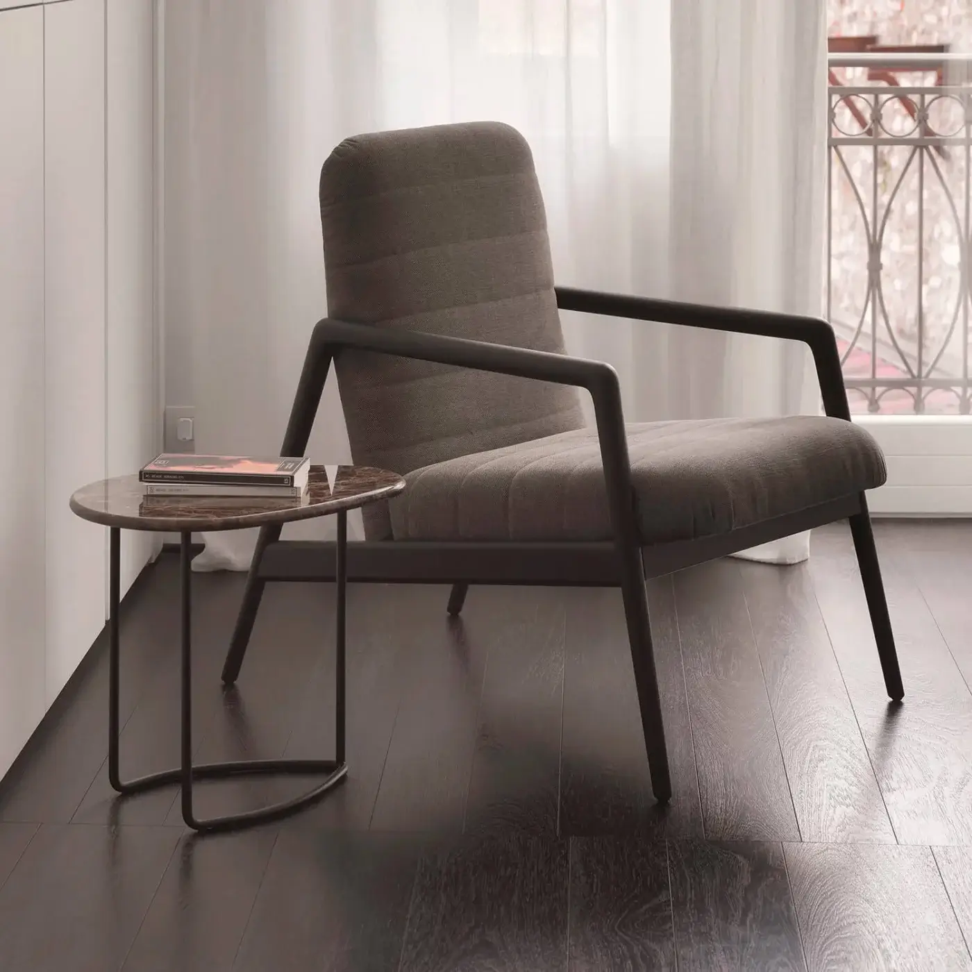Elegant Horm Carnaby lounge chair with horizontally striped gray fabric upholstery and matte wooden base
