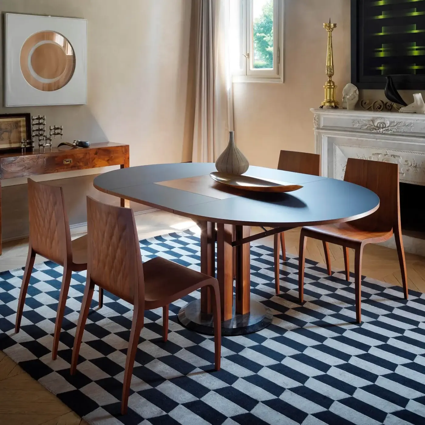 Exceptional Horm Flower extendable table with dark Fenix tabletop and warm brown Canaletto walnut panel crafted with a dark marble base