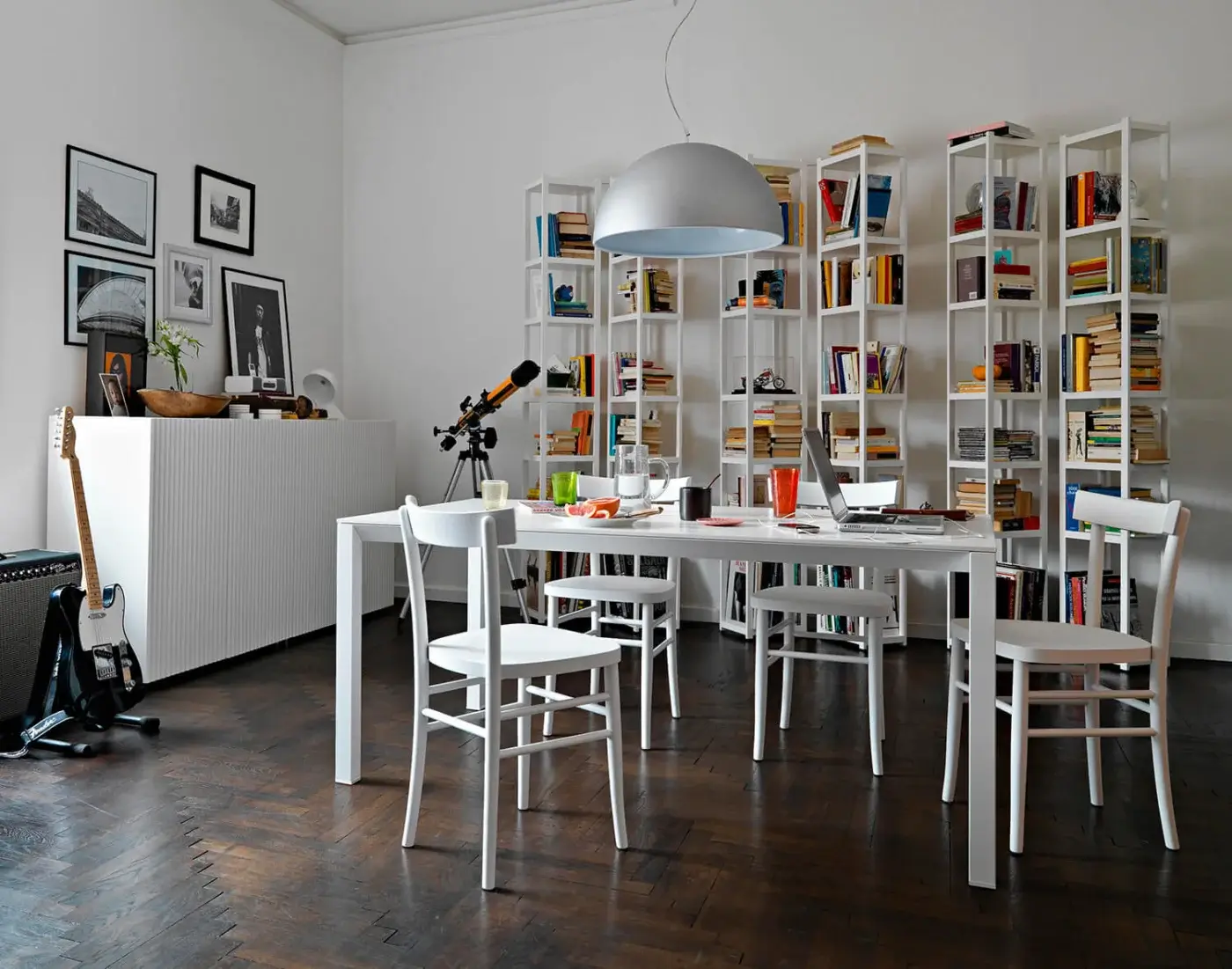 Superior Horm Singles bookcase presents a tall geometric form with fixed lacquered MDF shelves and a matte finish