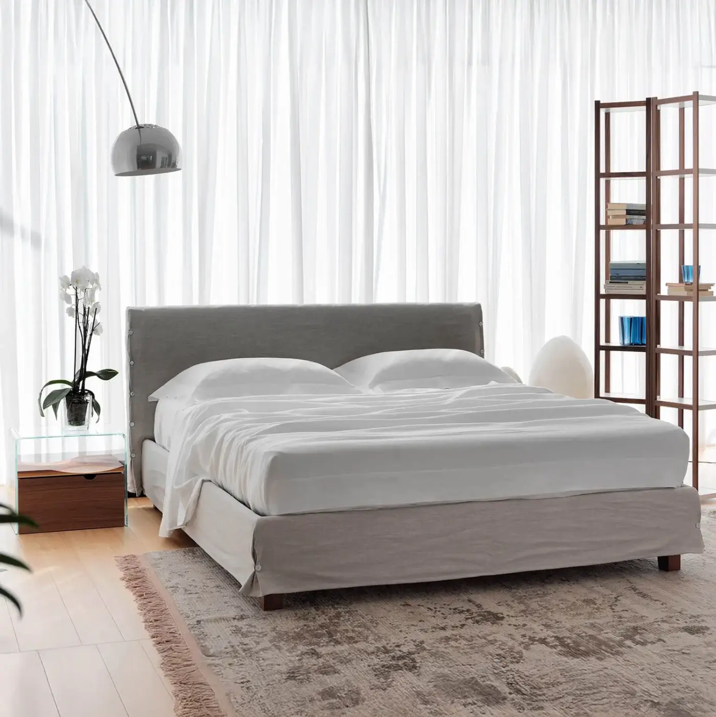 Superior Horm White bed with gray textile upholstery and mocha lacquered solid beechwood feet crafted in Italy