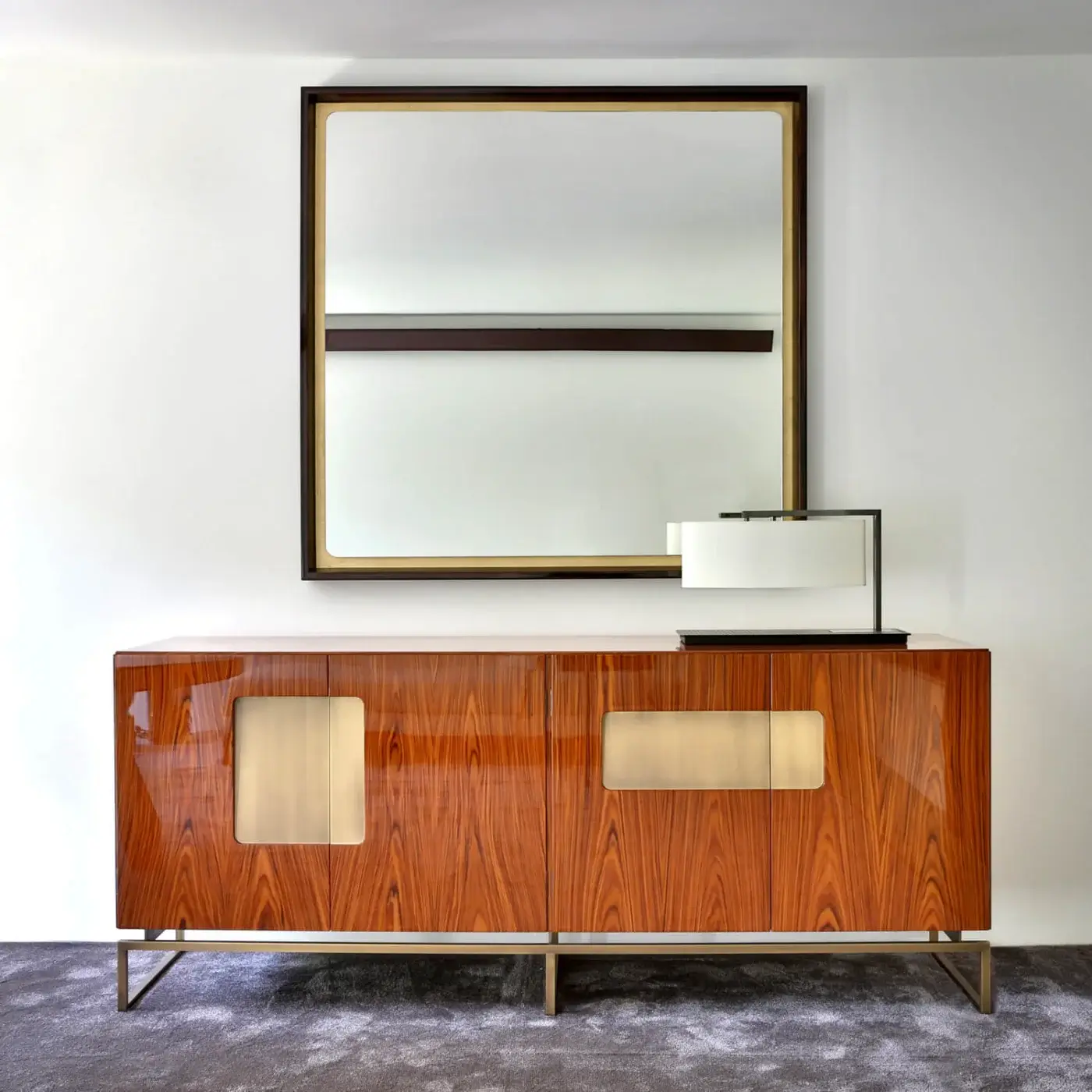 Distinguished Casa Casati Giorgio sideboard with reddish-brown wood and glossy transparent lacquer, accented by angular metal legs and lighter tone cut-outs