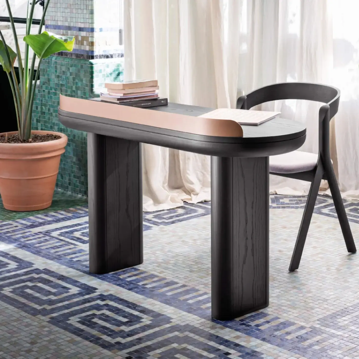 Exceptional Miniforms Jumbo desk crafted in Italy with matte black stained wood and light copper metal accents