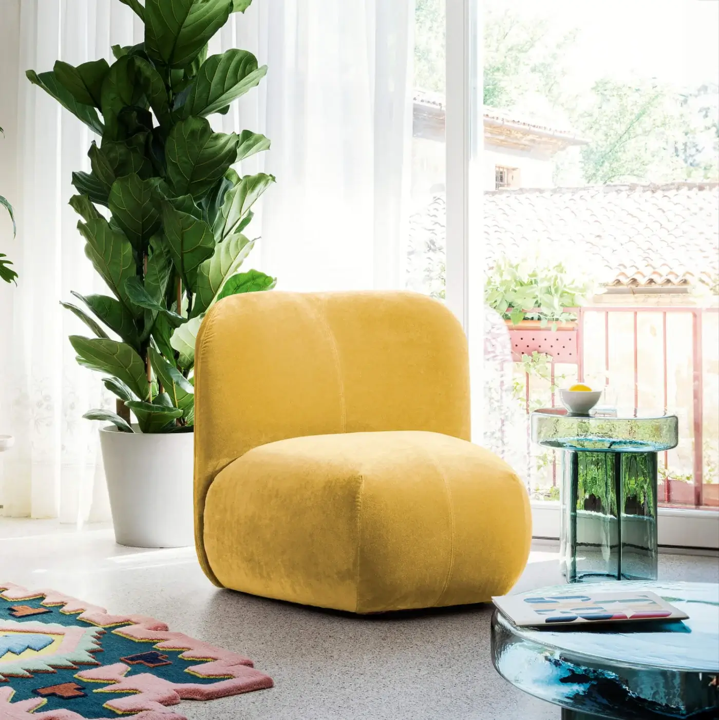 Exceptional Miniforms Boterina lounge chair in matte yellow textile with curved lines and a block aesthetic
