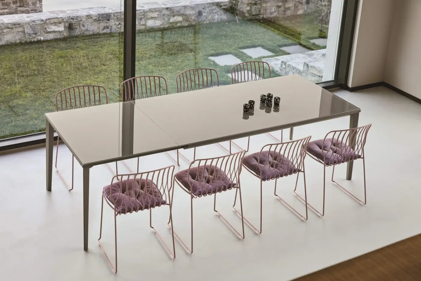 Distinguished Bontempi Echo extendable table with a glossy painted metal tabletop and neutral matte finish frame