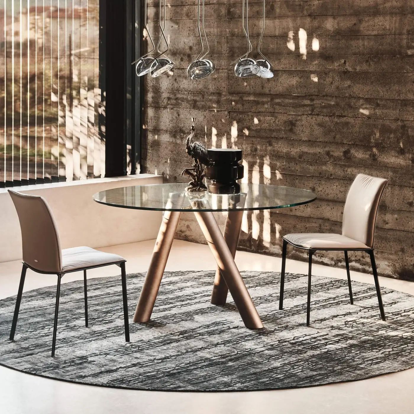 Superior Cattelan Italia Ray table crafted in glass with a unique three-legged steel base and satin light brown or bronze finish