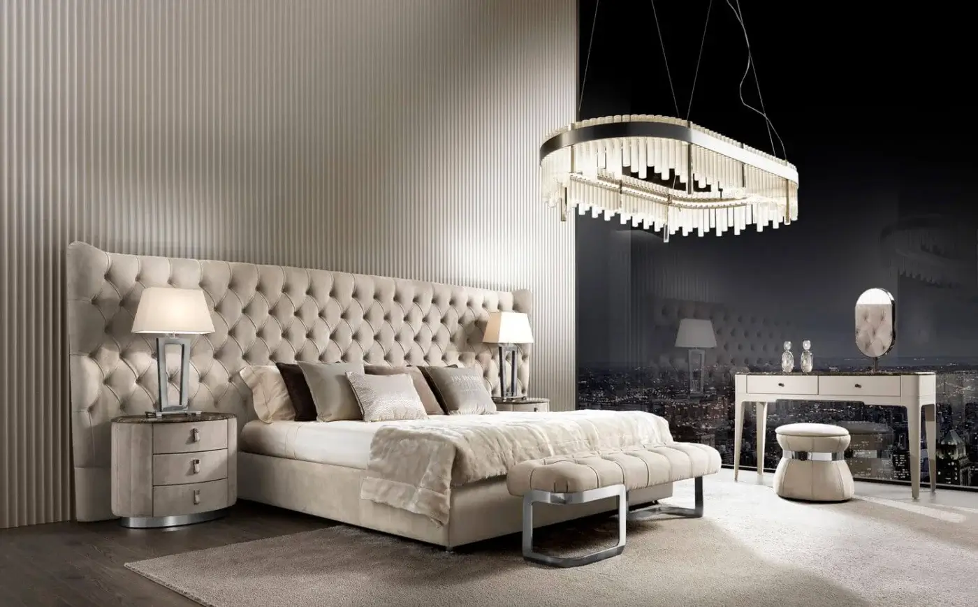 Elegant DV Home Collection Vogue nightstand with light beige leather and stainless steel base, finished in matte