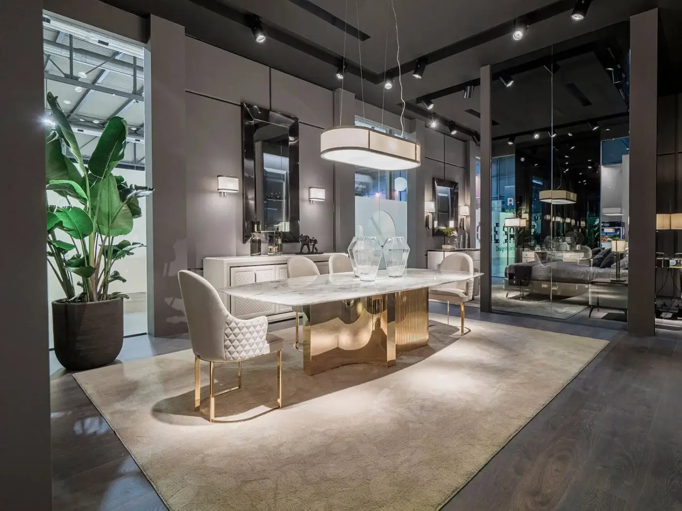 Distinguished DV Home Collection Tiffany mirror with shining stainless steel frame and natural glass reflecting a textured rug