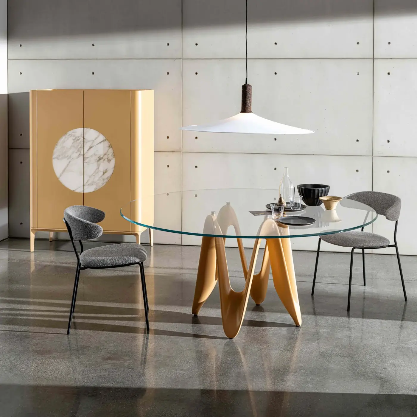 Distinguished Sovet Italia Lambda round table with solid Canaletto walnut wood base and tempered glass top in glossy beige finish