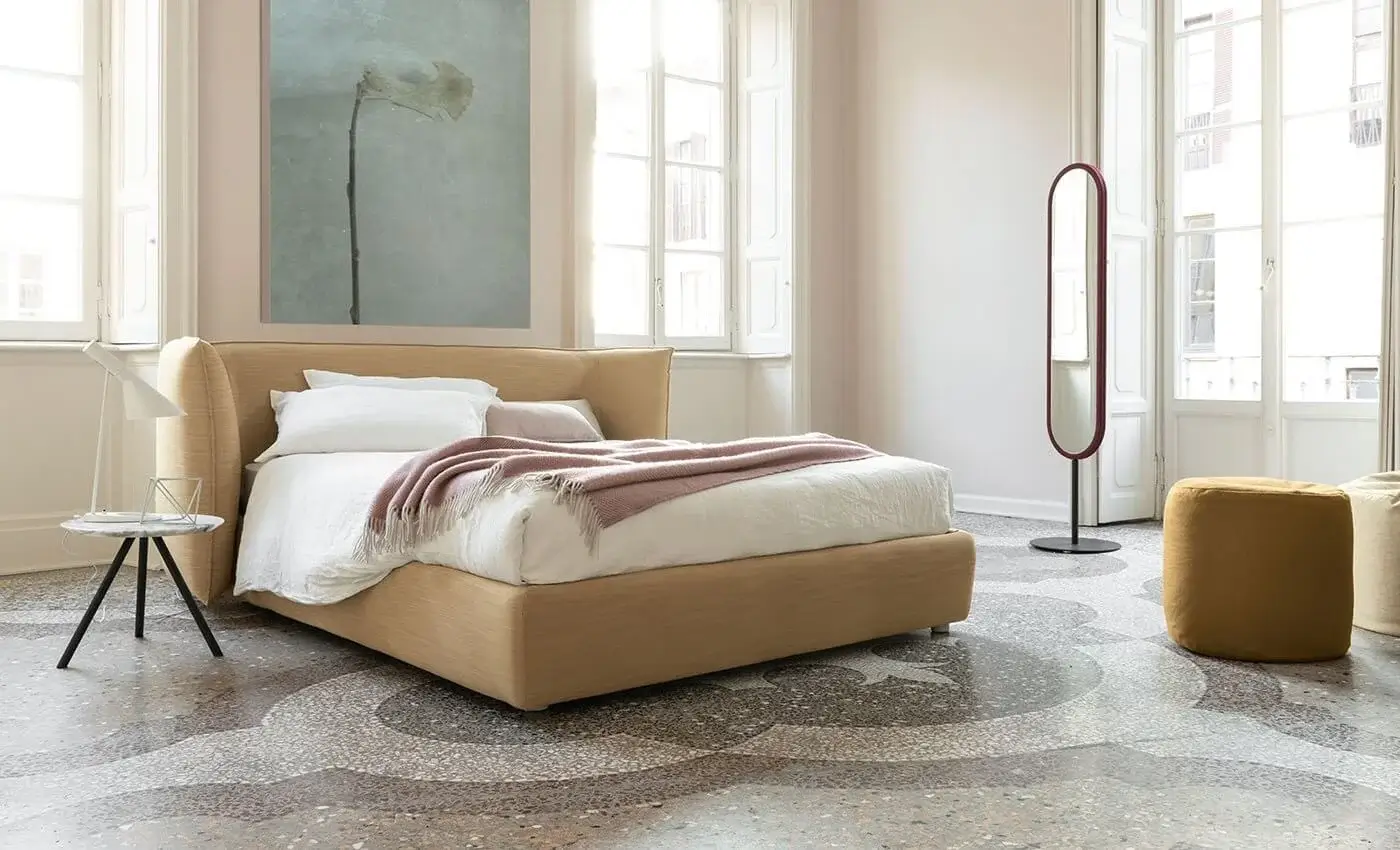 Lavish Bolzan Letti Jill bed crafted in Italy with light beige fabric upholstery and textured matte finish