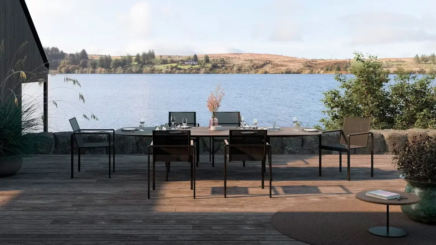Elegant Royal Botania Styletto table with tapered legs in coated aluminum and a round ceramic top with uniform finish
