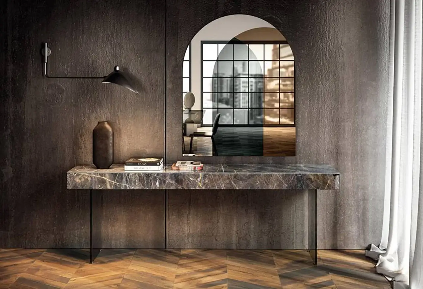 Lago materia console table, dark gray marble top, rectangular base with black legs, illuminated by a wall lamp in a minimalist interior.