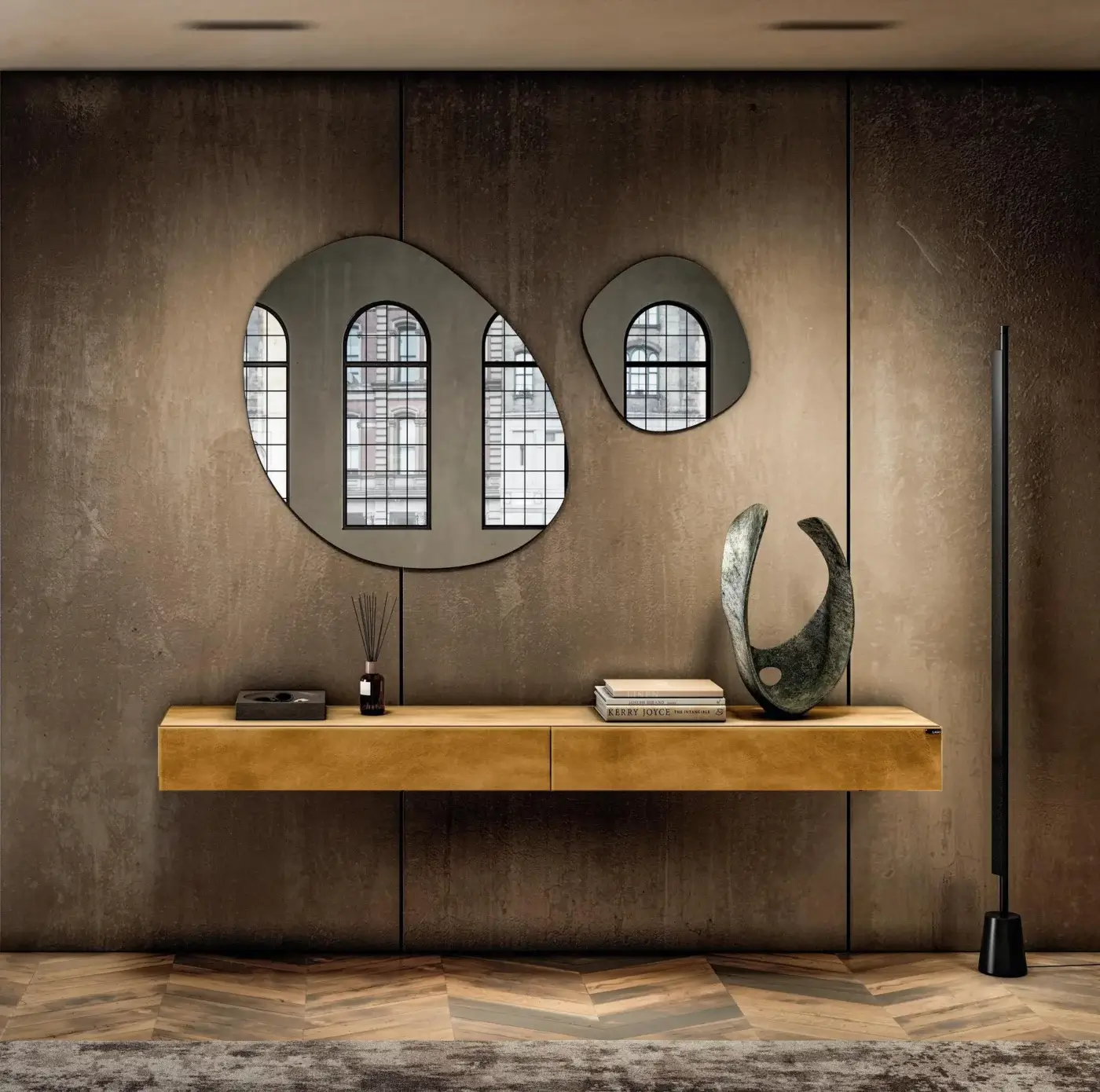 Lago Materia console, dark wood, horizontal slab, with metal arched window sculpture, green abstract art, books, and glass vase displayed.