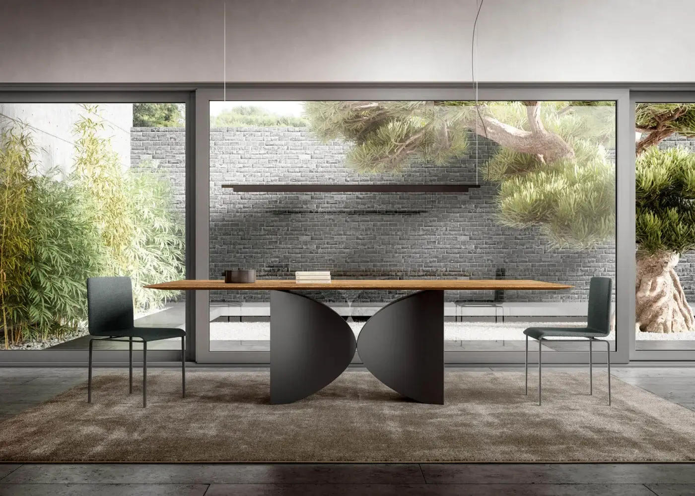 Lago dining table with wood grain top and dark gray curved base, paired with gray fabric chairs and linear pendant light in modern interior.
