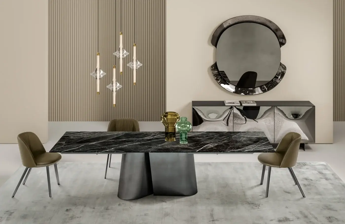 Extendable table, black marble-effect top, dark grey biomorphic base, tan leather chairs, fluted beige wall, gold pendant lights.