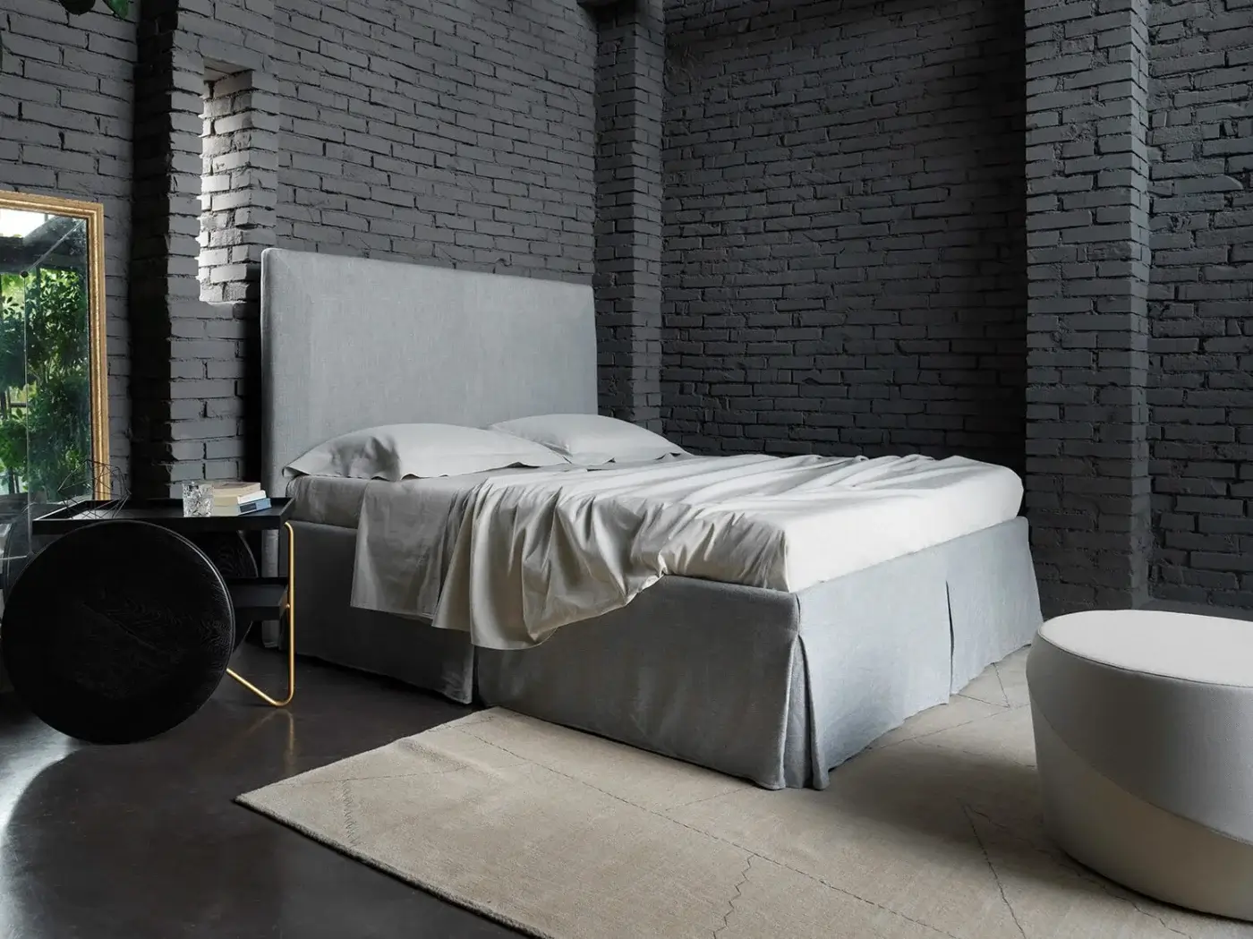 Elegant Horm Sardegna bed with light grey premium fabric upholstery and natural lacquer solid beechwood feet