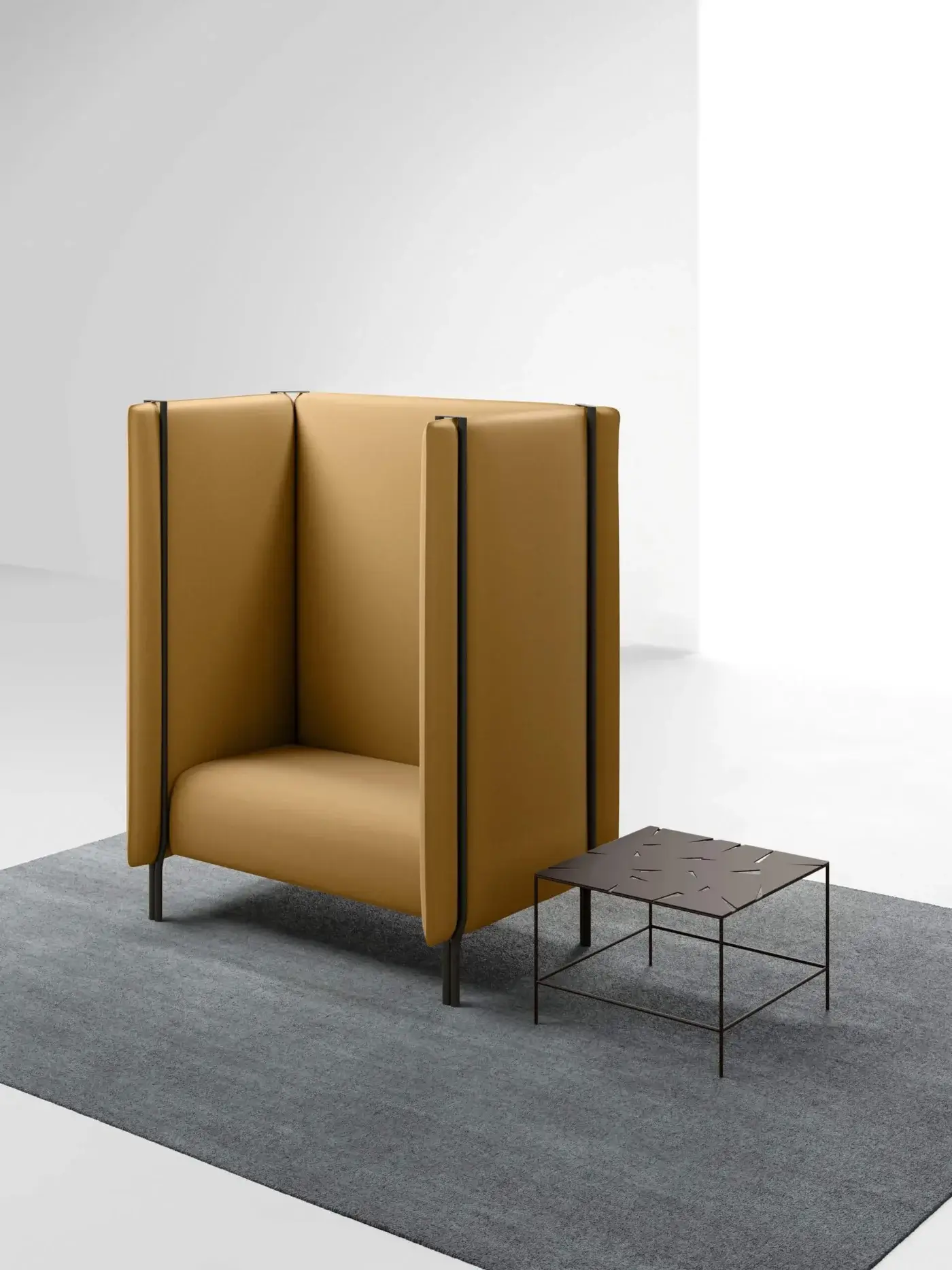 Mustard armchair with dark gray accents and metal base, paired with a square coffee table featuring intersecting dark gray metal tabletop.