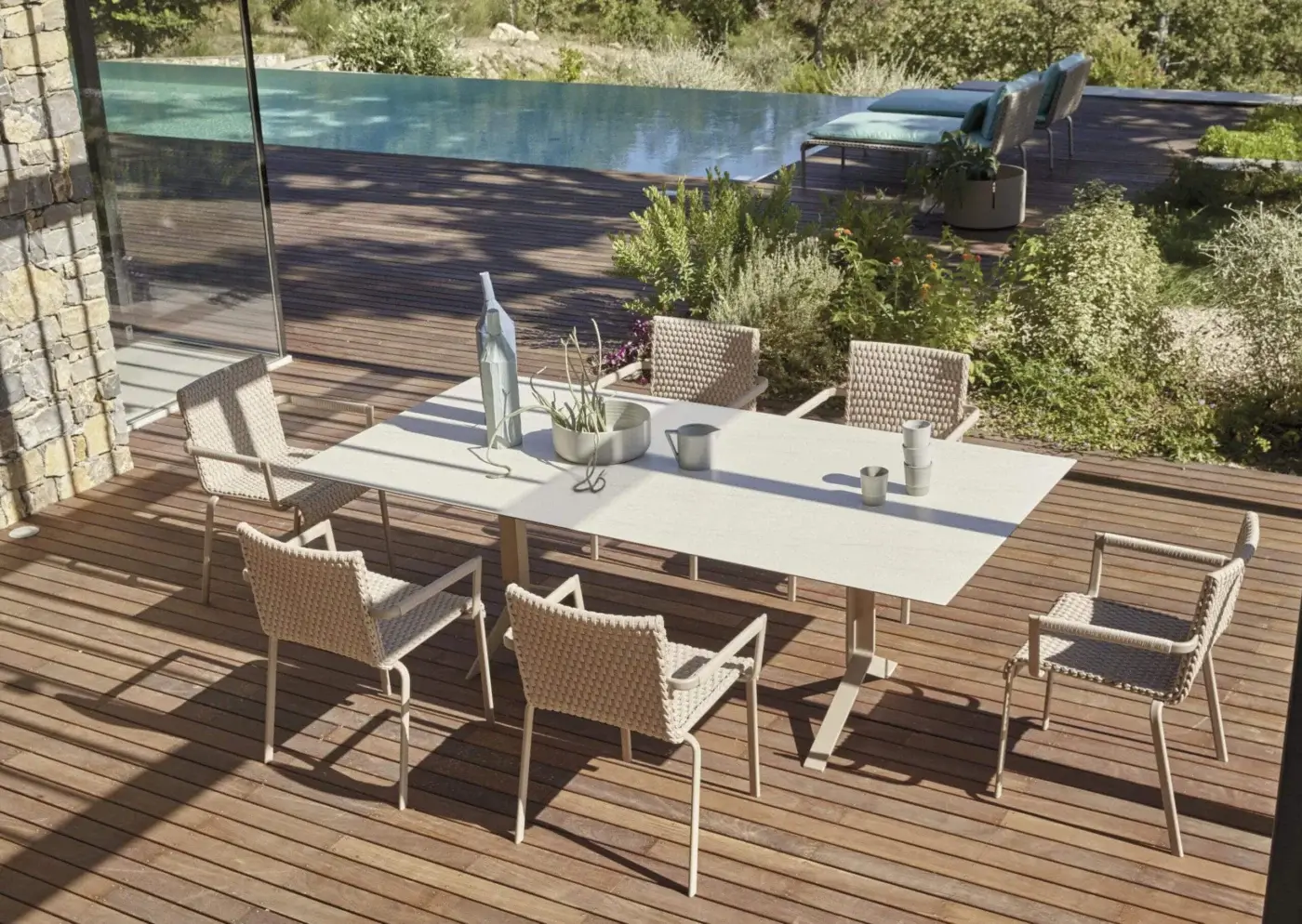 Distinguished Roberti Rattan Key West armchair with light beige Sunrope weaving and powder-coated aluminum structure