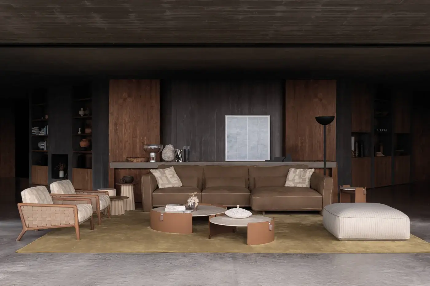 Lavish Cierre1972 Loden sectional with adaptable design upholstered in muted earthy brown textile and refined leather piping