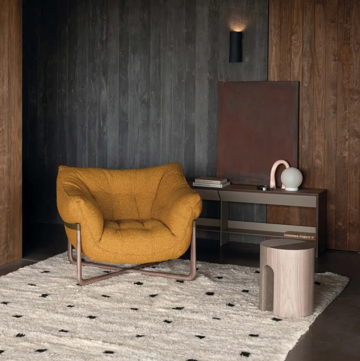 Elegant Cierre1972 Donald lounge chair with golden-yellow textile upholstery and brushed bronze metal frame