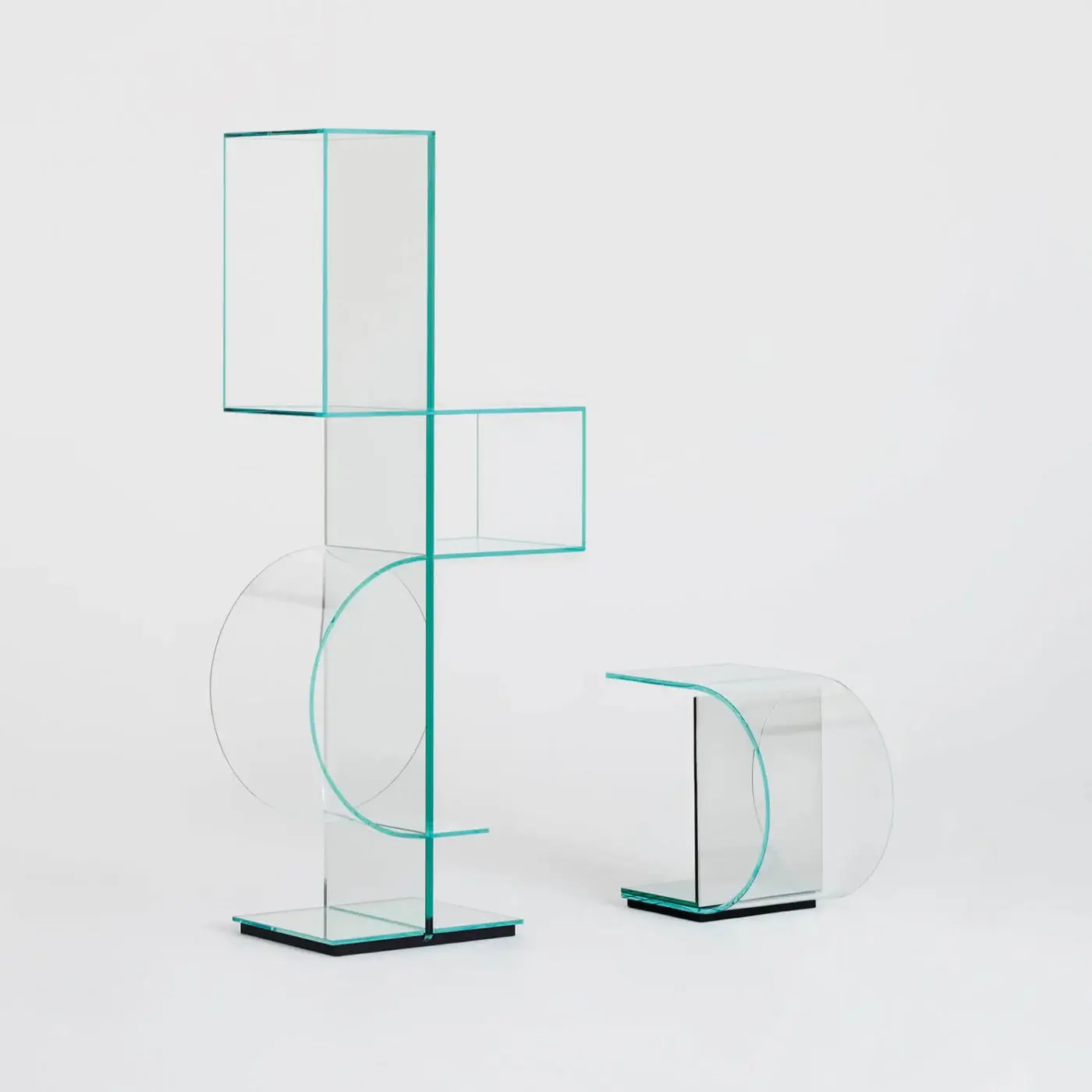 Superior Glas Italia Ollie side table with pale teal extralight glass and mirrored base crafted in Italy