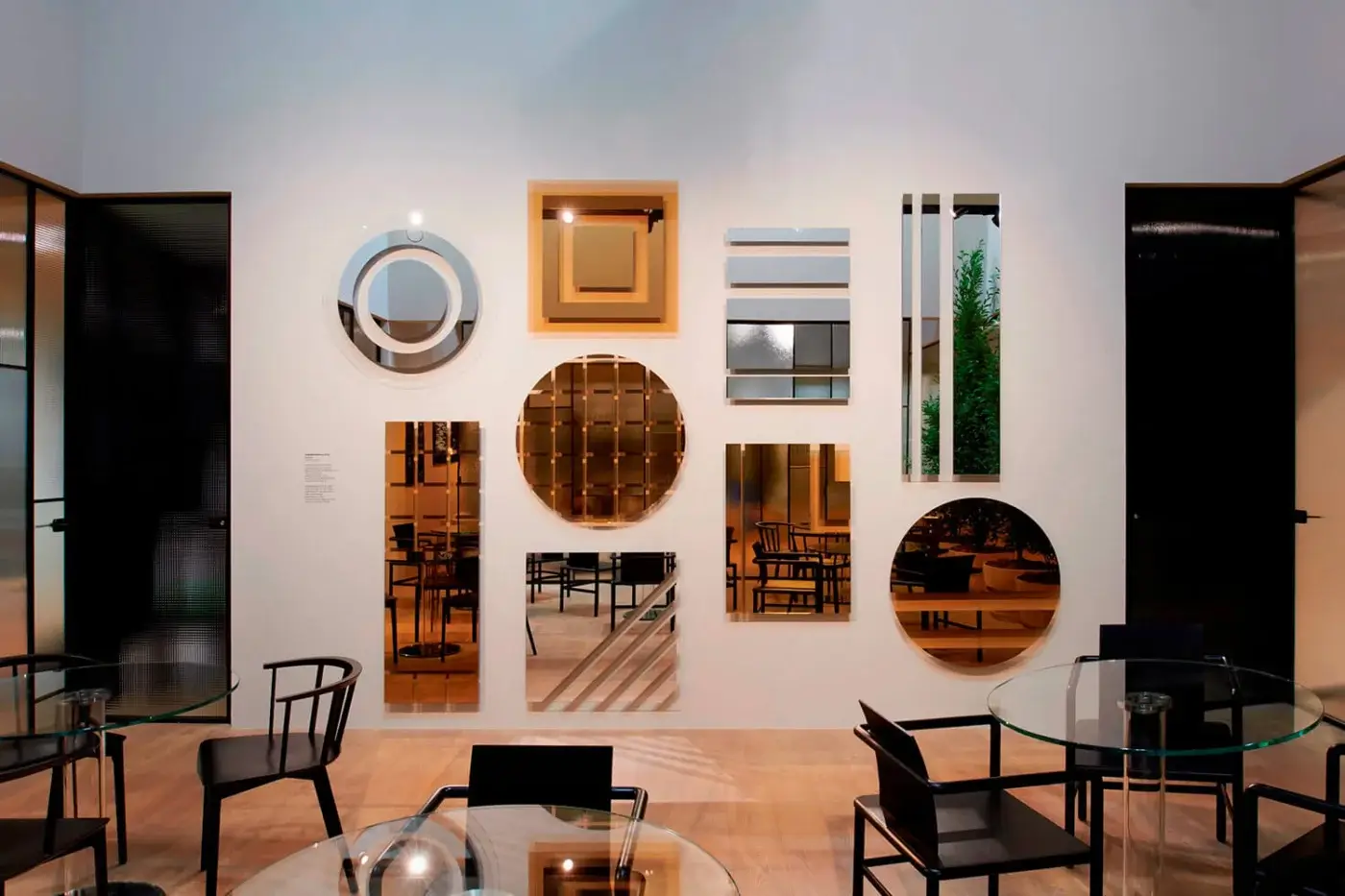 Distinguished Glas Italia Andromeda mirror crafted from glass and wood with a crisp white finish and polished accents