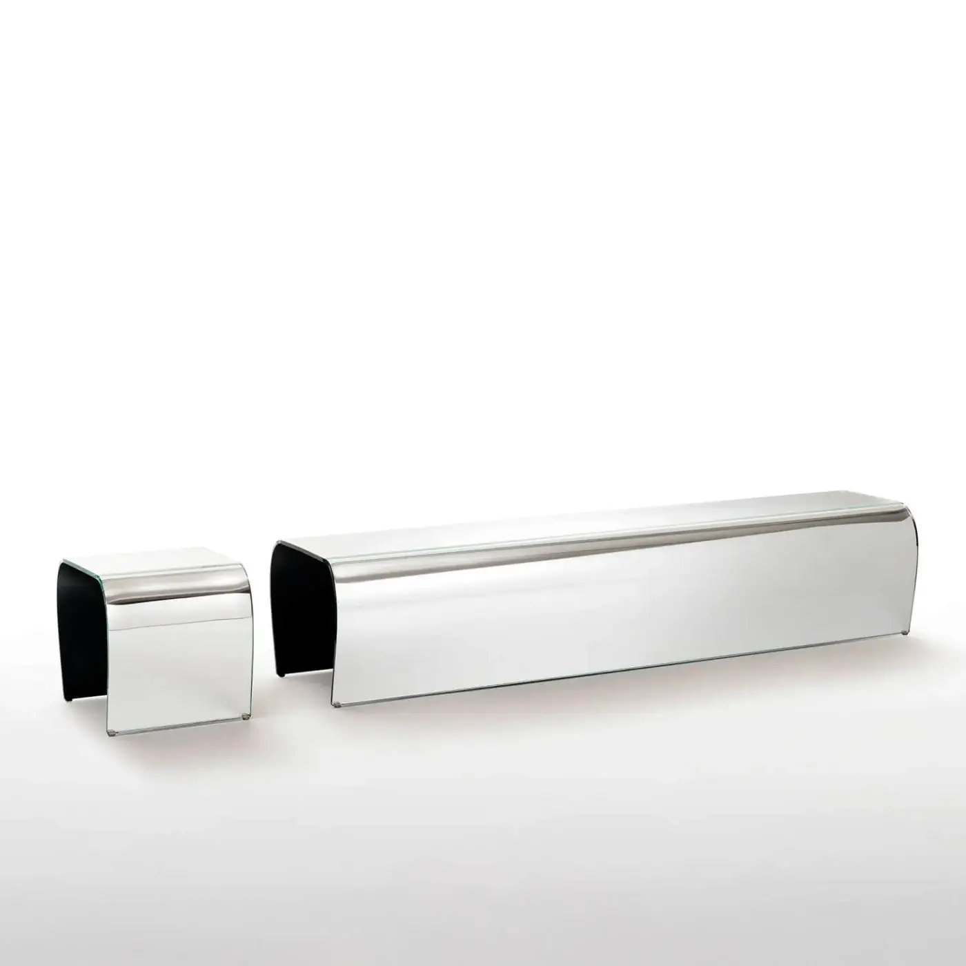 Captivating Glas Italia Bent ottoman crafted from a single sheet of transparent extralight glass with a curved silver finish