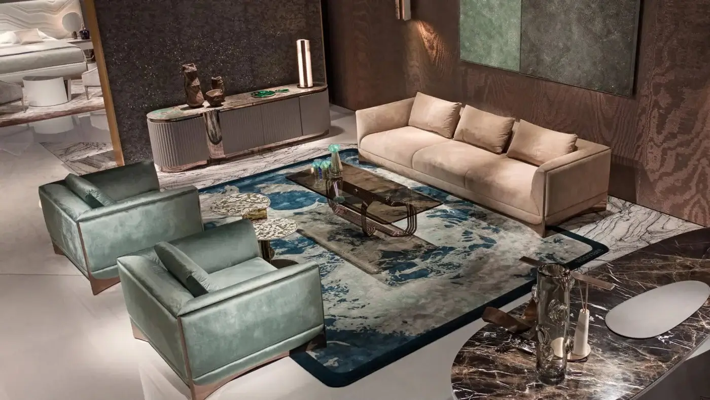Harmonious Visionnaire Ca’ Foscari lounge chair built with grayish-green textile upholstery and satin wood with polished metal trim